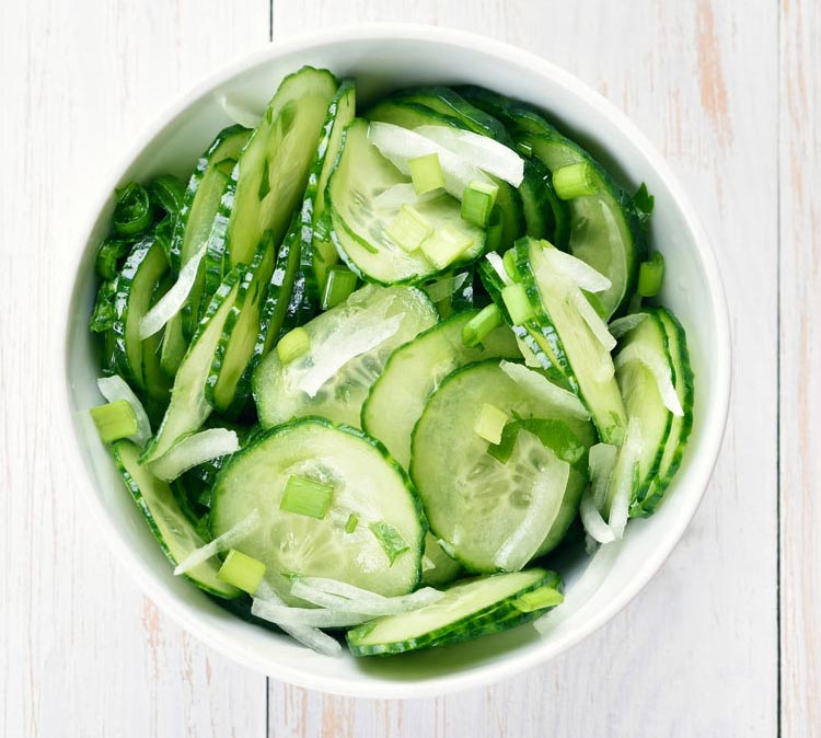 Combine cucumbers, onions, celery, and stevia to make a healthy cucumber salad.